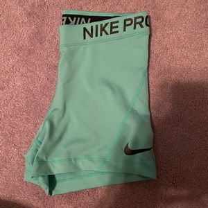 Teal Nike Pros size small